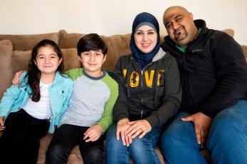 Ahmed pictured with his wife, daughter, and son