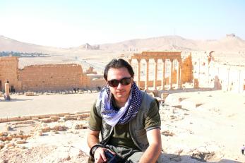 Emad sitting in front of the temple of bel
