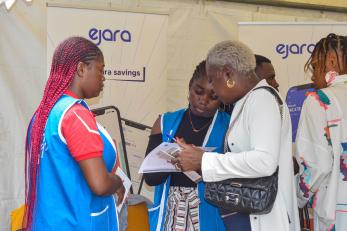 A customer exchanges information with a company representative.