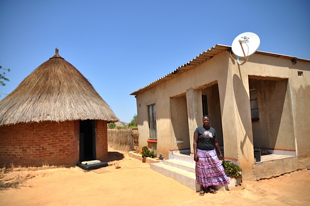Woman outside house