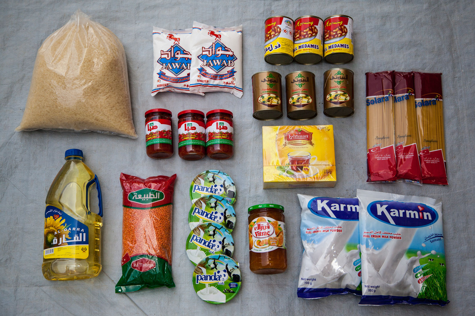 Syrian refugees have few options to support themselves, making it difficult to purchase even the most basic necessities, like food. Mercy Corps distributes essential supplies to help vulnerable families meet their basic needs. Photo: Sumaya Agha for Mercy Corps
