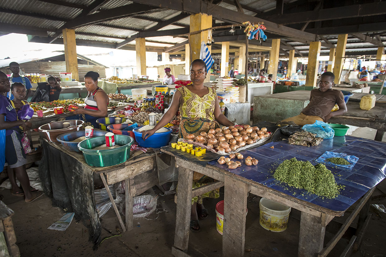 Sarah, 46, grows and sells cassava, onions and other vegetables as a way to help her husband earn a living and feed their children. But when Ebola hit this area of Liberia, officials tried to stem its spread by restricting travel and public gatherings. "There was no way to get to the market," she says. One of Mercy Corps’ main objectives in Liberia was to improve food security in the wake of the Ebola crisis. Photo: Sean Sheridan for Mercy Corps
