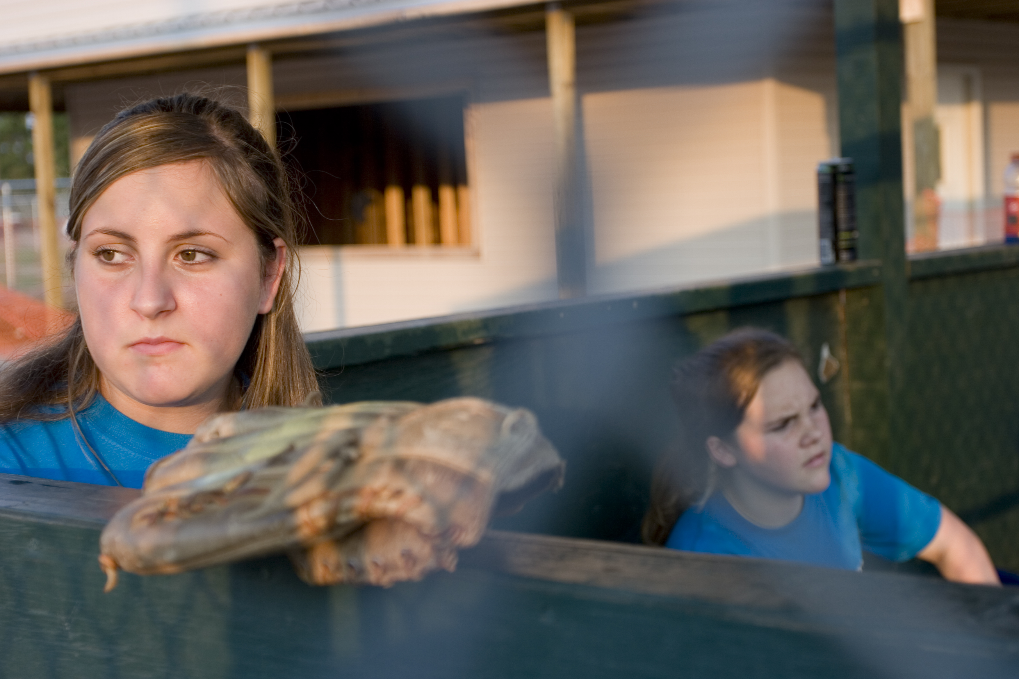 Girls playing softball in the aftermath of Katrina in New Orleans
