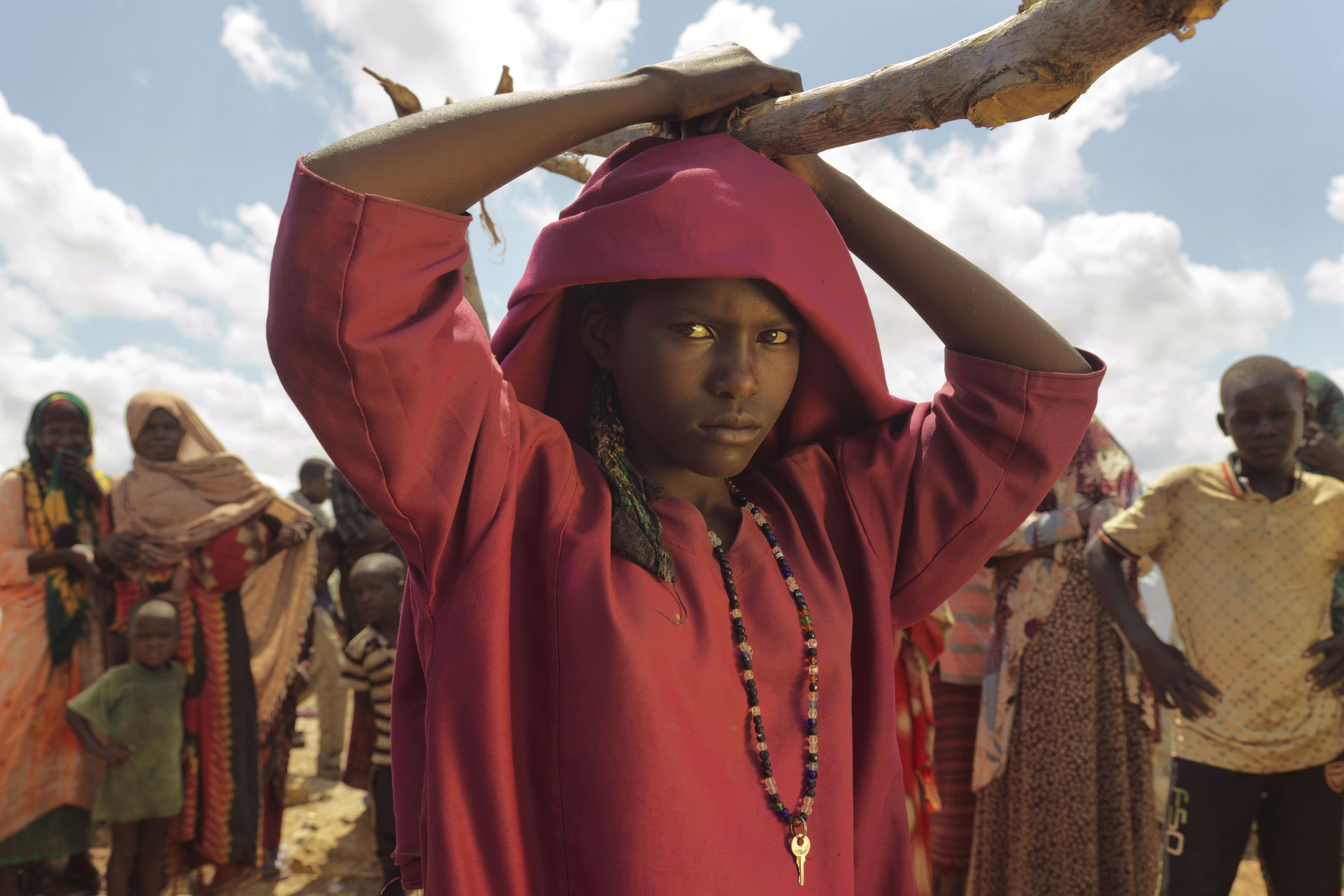 Girl in Somalia with red top and scarf