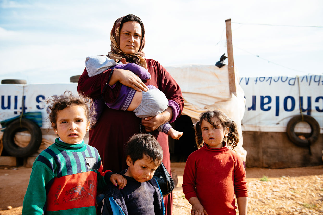 A woman with four young children in Lebanon