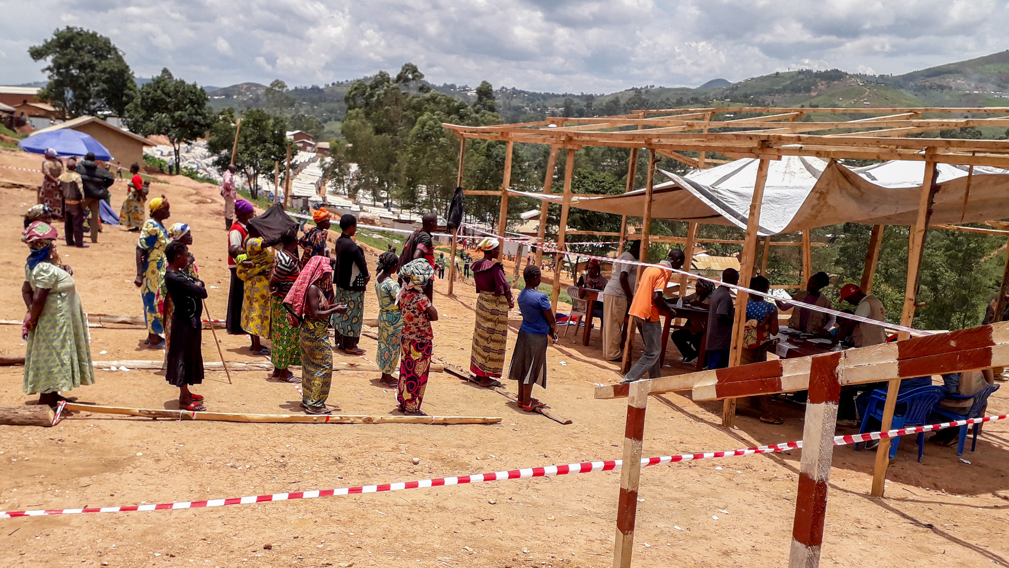 DRC community members in line for Coronavirus services.