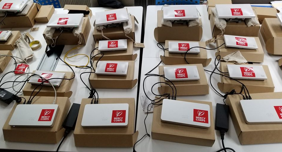Electronic equipment used for wireless communication is laid out on a table.