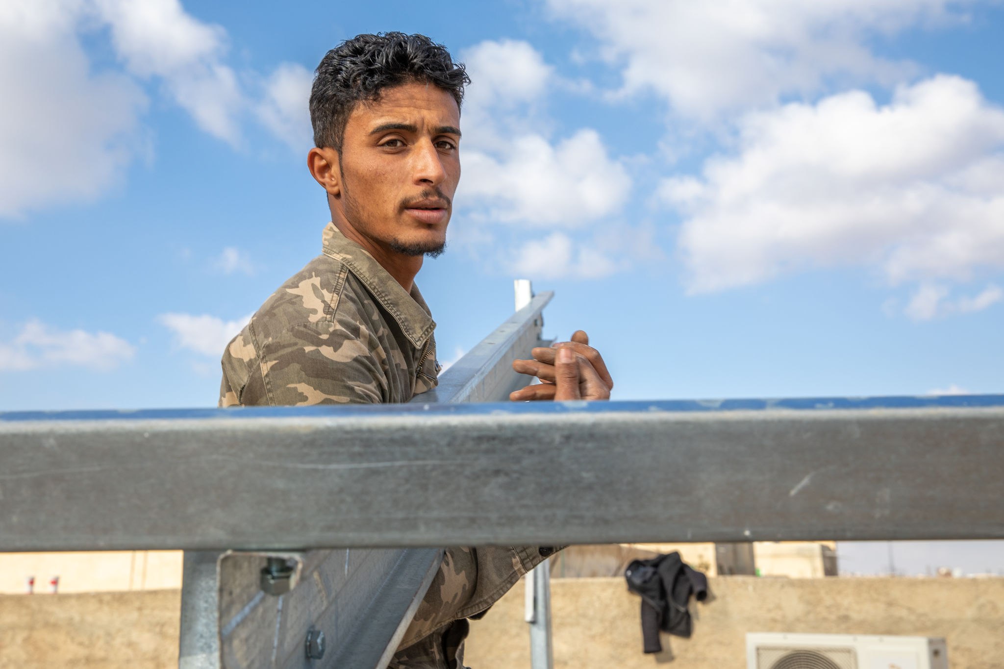 Jordanian man working outside.