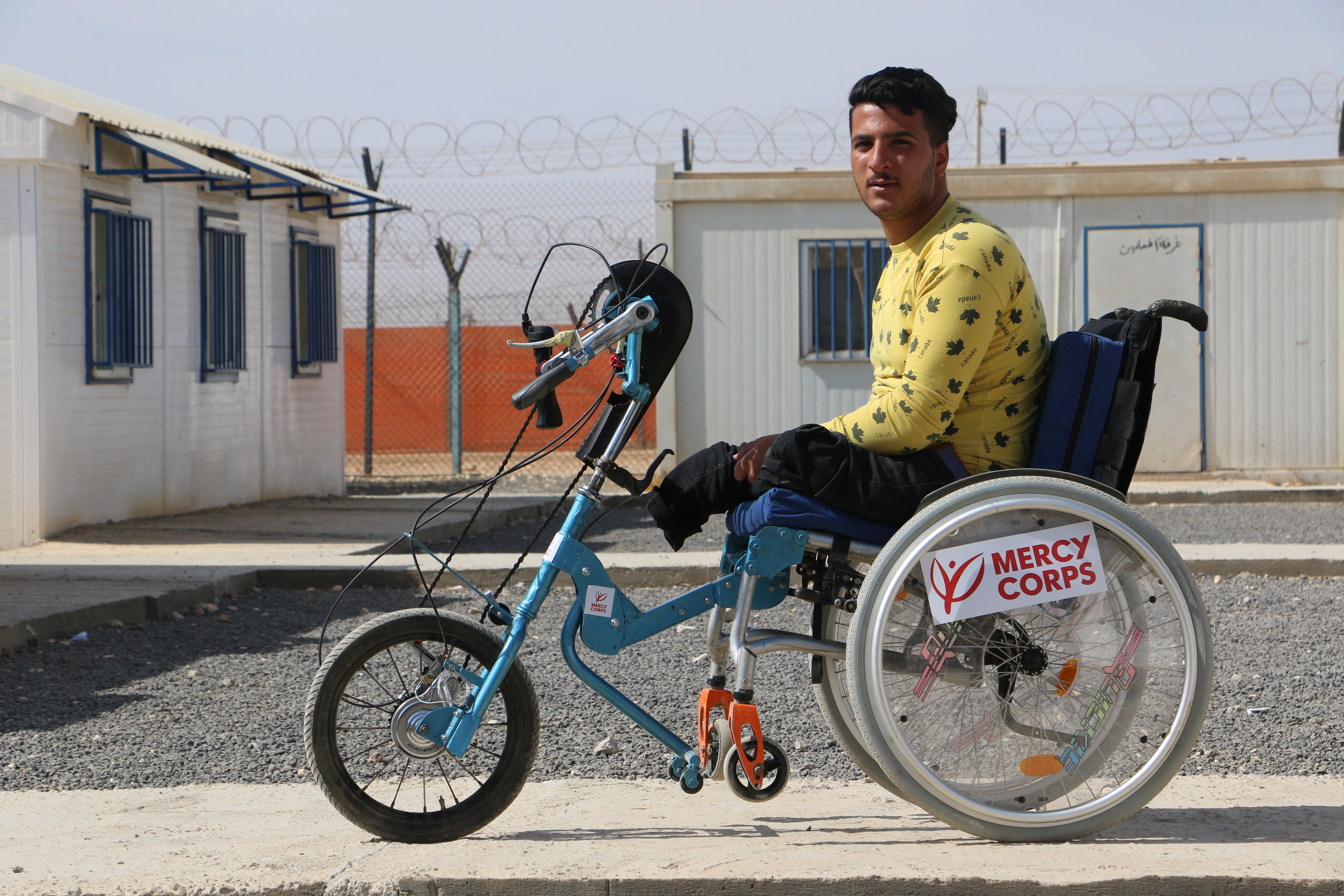 A person in a customized wheelchair.