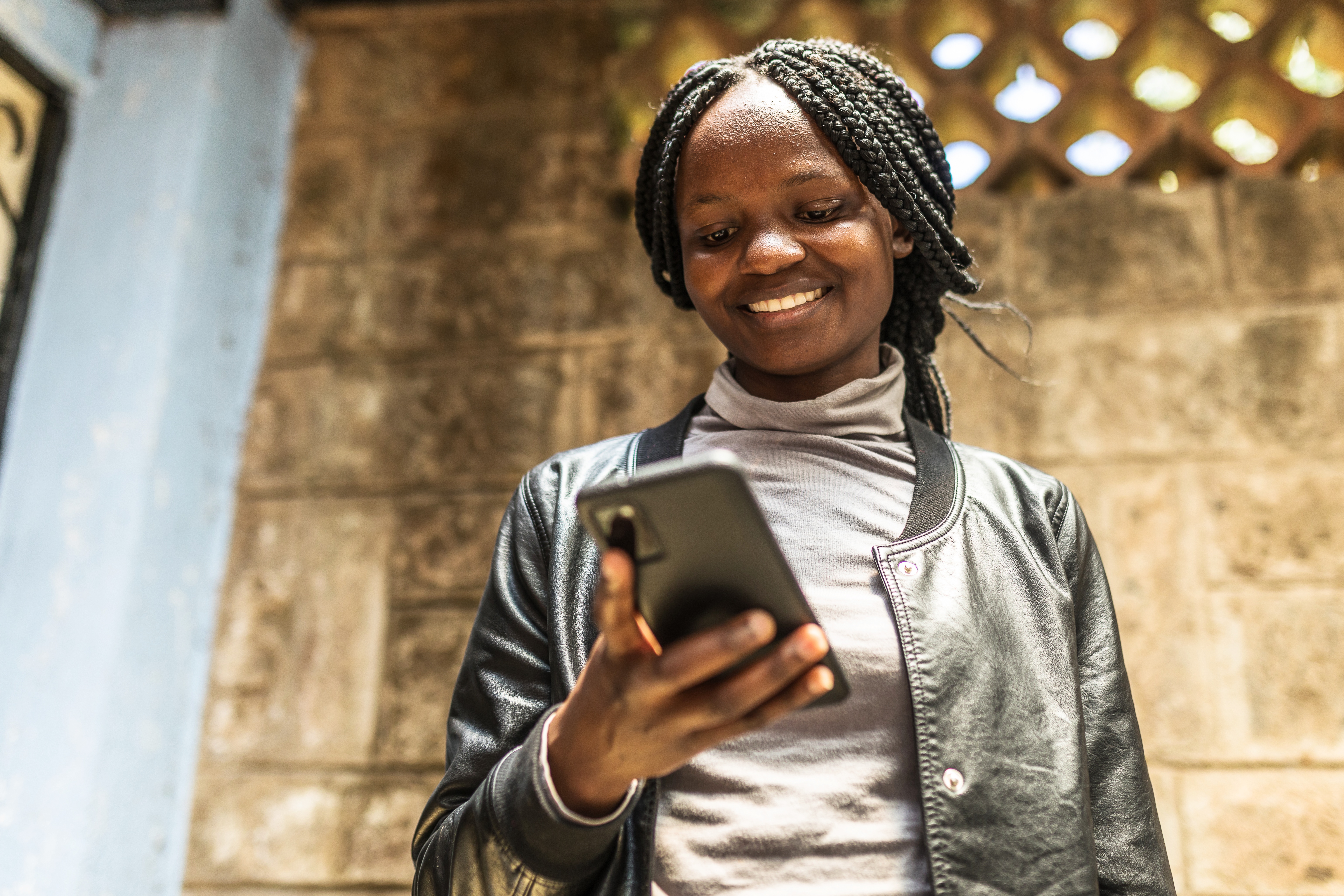 A person using a mobile phone.