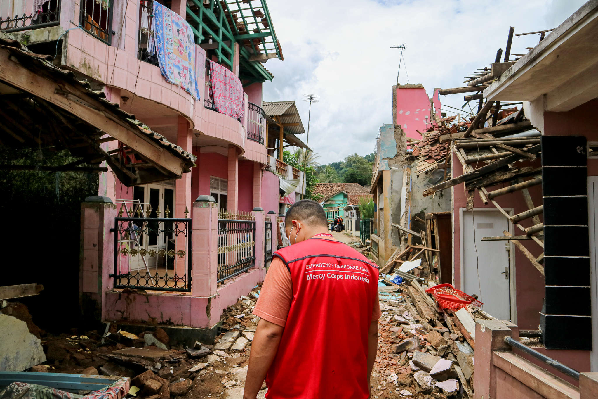 A mercy corps indonesia response team member conducting needs assessments in the cianjur district following the earthquake that struct west java.