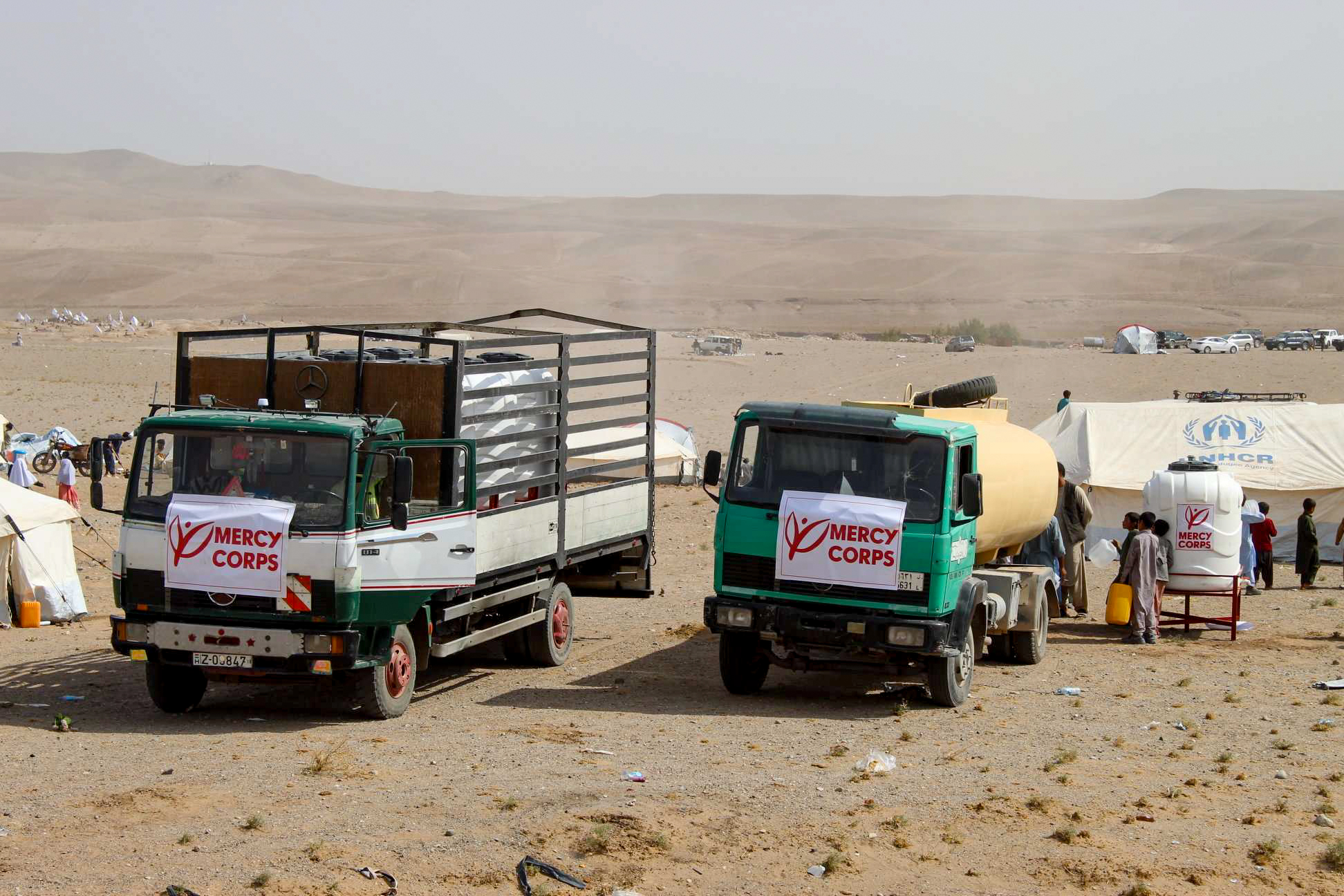 Entire villages were forced to relocate after the earthquakes struck northwest afghanistan. at this encampment, mercy corps is providing clean water to more than 300 families.