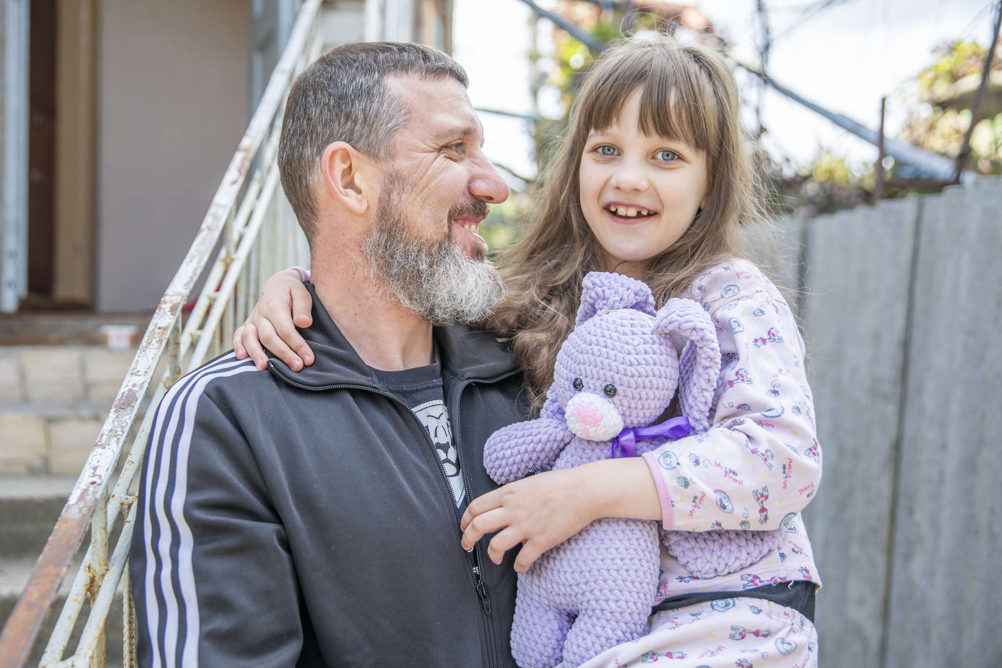 A husband and father of two with his youngest daughter.