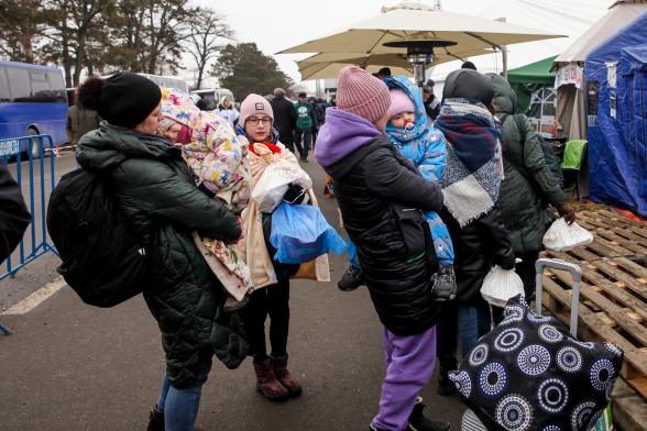 Women and children fleeing ukraine at the romania border.