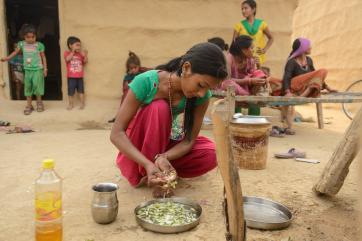 Sarmila preparing food