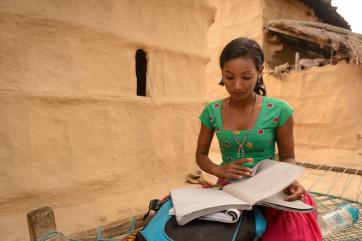 Sarmila reading a book