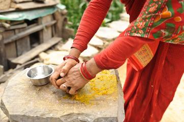 Crushing spices in nepal