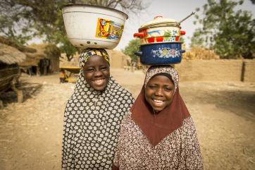 Friends mariya and badariya in niger after participating in one of mercy corps' discussion groups for girls. photo: sean sheridan for mercy corps