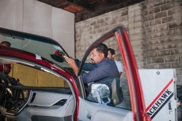 Man working on car