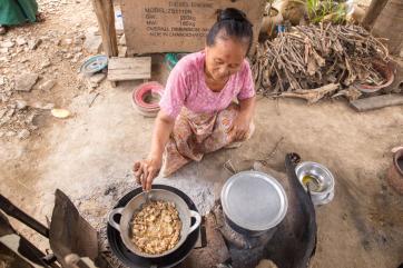 A person cooking food.