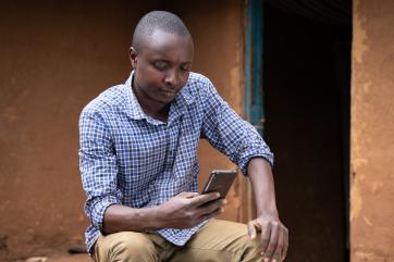 Brian mouti uses the sunculture solar-powered water pump to irrigate his crops.