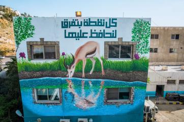 An art mural promote water conservation in amman by artists wesam shadid and ibrahim tonnerieux.