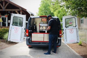 Eddy holford using his mobile café business equipment.