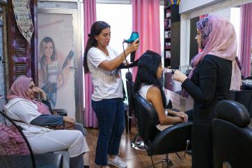 Salon owner, samiha in her business.