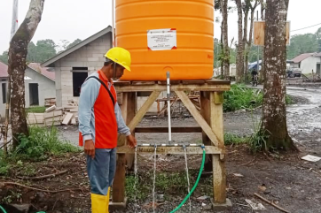 A person using a water point.