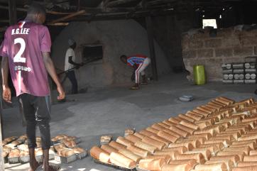 Fresh and timely baked bread left to cool for packaging and distribution.