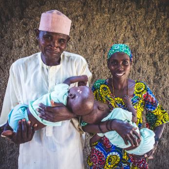 Alhaj, left, with his wife kursya and their baby twin boys