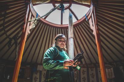 Woman in mongolia with a drone