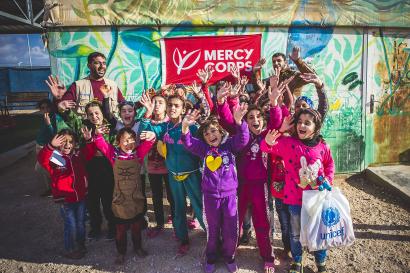 Jordanian children waving and smiling