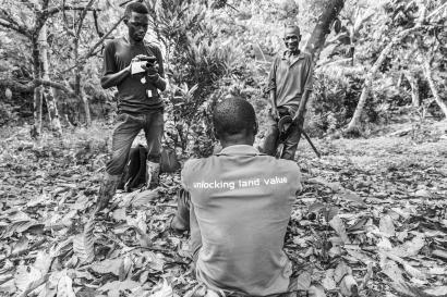 Three men in a jungle setting