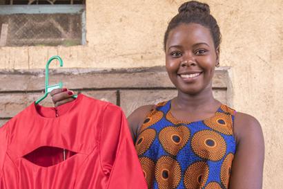 Young woman with shirt she created.