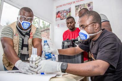 Congolese men working in a laboratory.