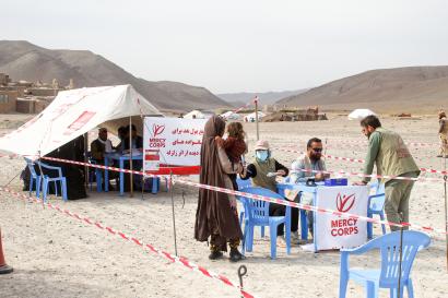 Mercy corps cash distribution site and staff.