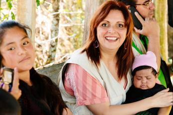 Clara ramirez holding a young child