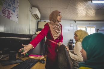 Khawla teaching computer skills