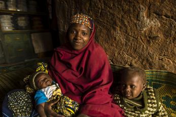 Nana with two young children