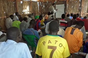 Teachers attend a training session