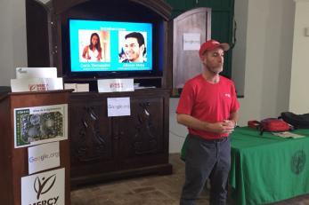 Mercy corps' puerto rico program director jeronimo candela addresses a group of small business owners