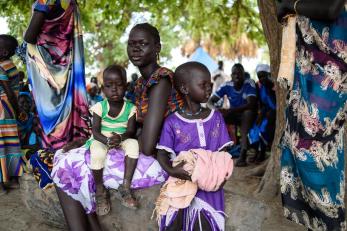 A woman with two children in south sudan