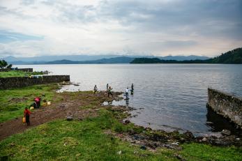 People fetch water from lake kivu