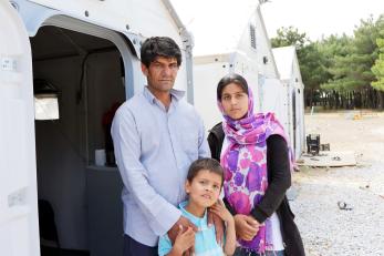 A father with his daughter and son in greece