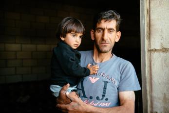 A man holds his daughter in lebanon