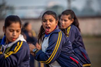 Nepalese women practicing self-defense moves.