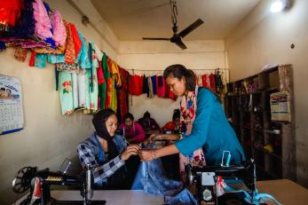 People working in a tailoring shop.