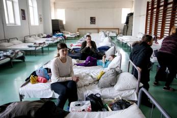 Parents and children in a refugee center.