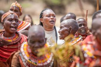 Women from surrounding villages in a ceremony praying for rain in ngilai, kenya.